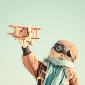 photodune-5839302-happy-kid-playing-with-toy-airplane-s-480x480